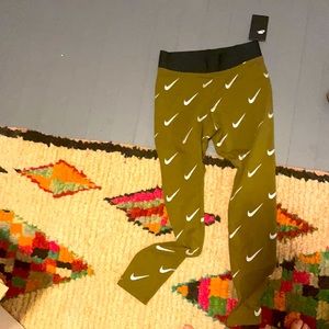 Nike leggings in army green with silver swoosh